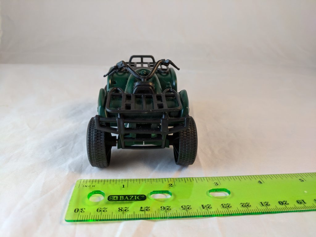 Green 4Wheeler Plastic Toy Vehicle Fakie Spaceman