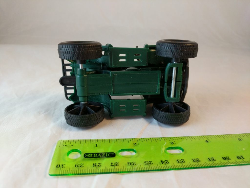 Green 4Wheeler Plastic Toy Vehicle Fakie Spaceman